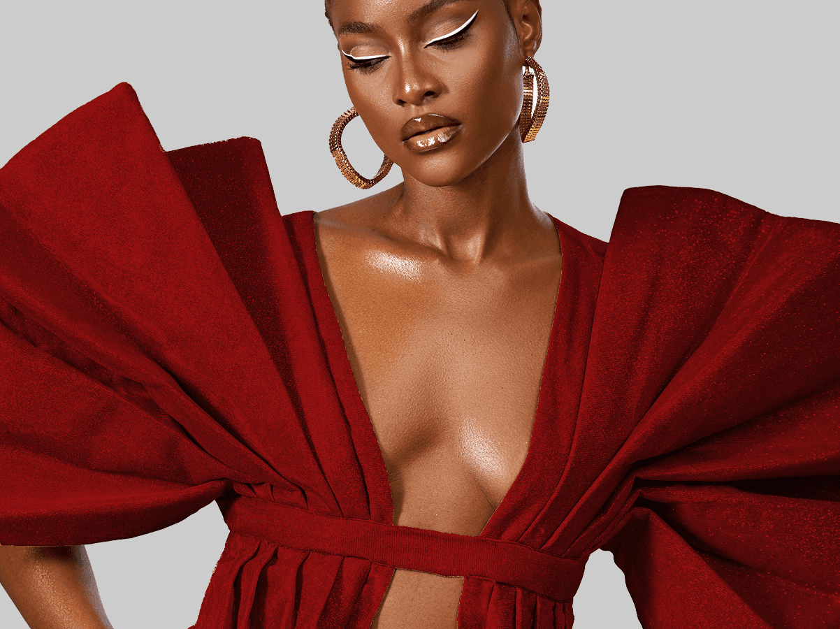 Fashion model in red dramatic outfit